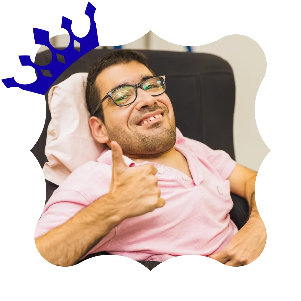 Disabled man giving thumbs up to the camera